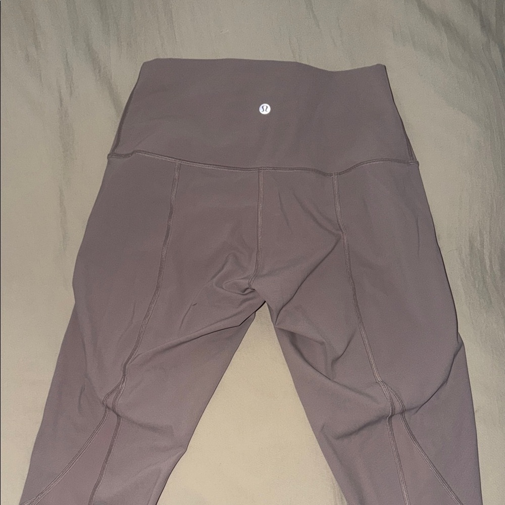 Comfy, gently used lilac lululemon leggings with scalloped legging. 25 length